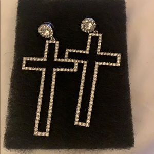 Dangling across earrings